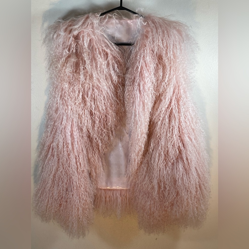 - Pink shaggy fur vest
